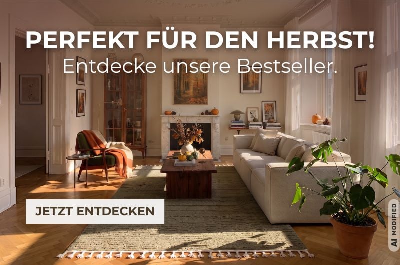 Gr&uuml;ner Teppich f&uuml;rs Wohnzimmer in einer gem&uuml;tlichen herbstlichen Einrichtung